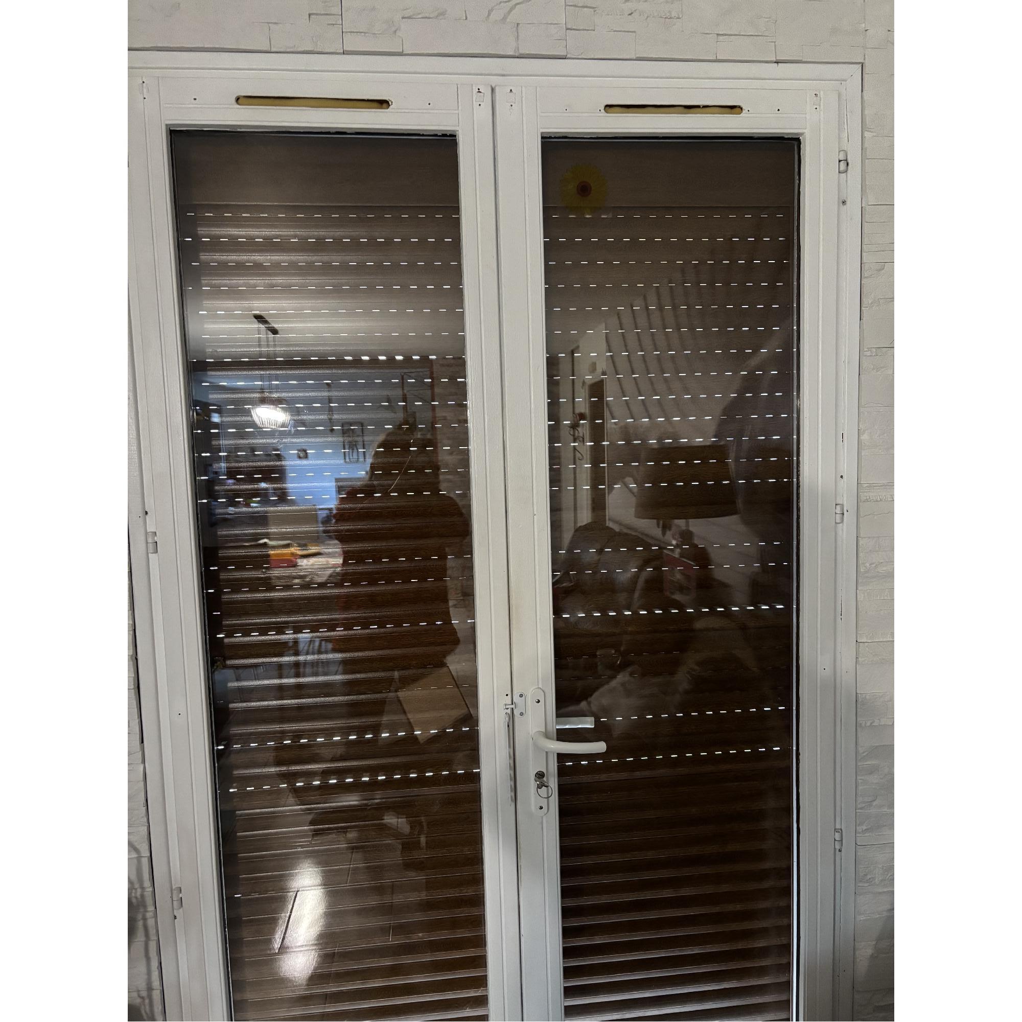 photo-Bruno installe sa porte-fenêtre sur mesure avec succès